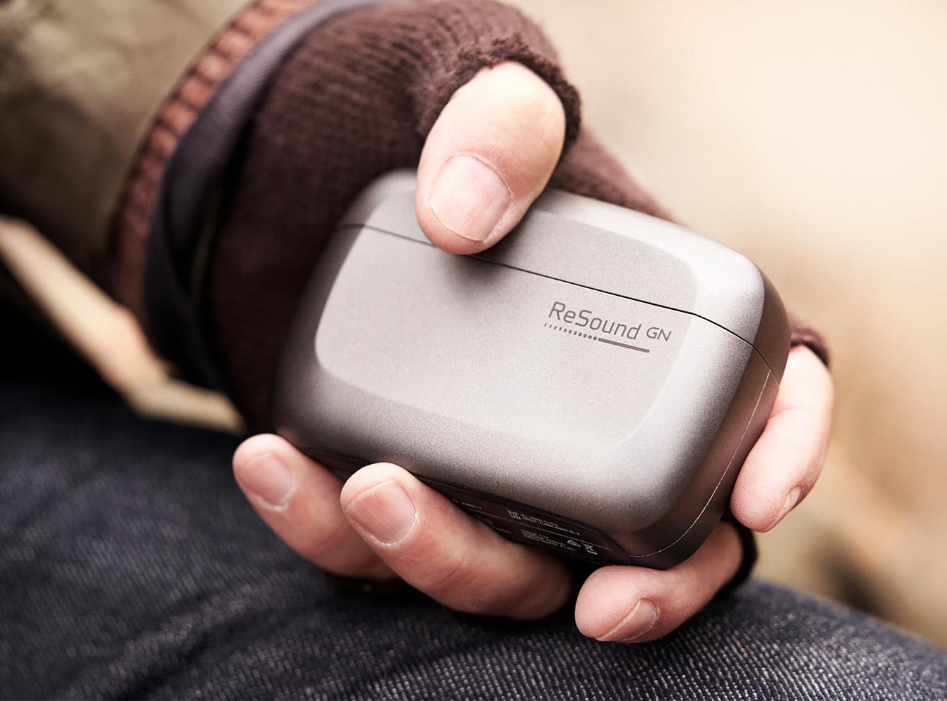 man_holding_rechargeable